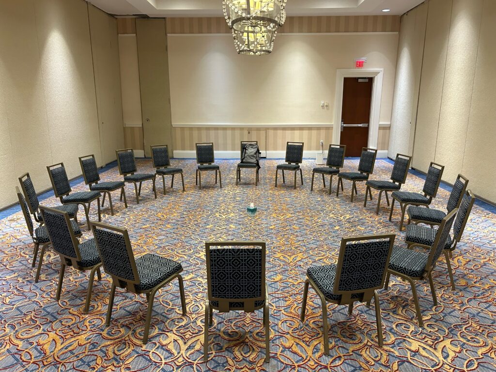 A circle of empty chairs